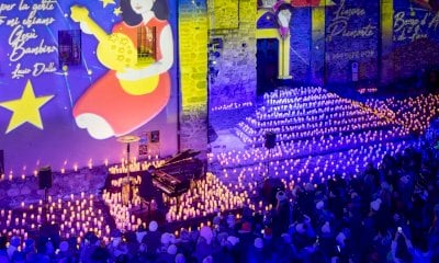 Piazza del Municipio a Limone Piemonte illuminata da 2 mila candele: grande successo per Canale Light