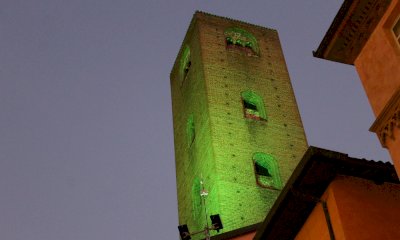 Alba, torri illuminate di verde per la Giornata Mondiale della Salute Mentale